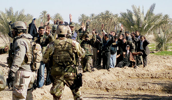 TF Raptor assualters take control of fleeing Iraqi police, Scouts, and government officials to effect a safe passage of lines.