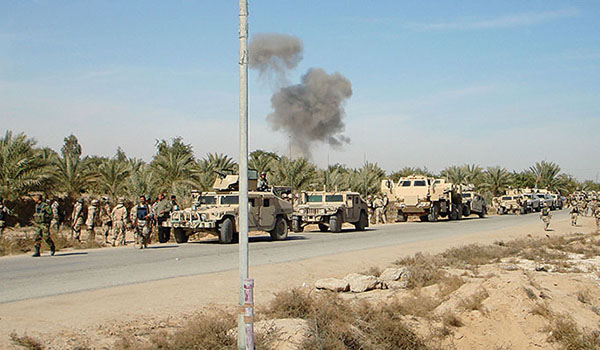 Camp David after helping Iraqi police and military break contact in the late morning (28 January 2007). The TF Raptor wrecker is towing a battle-damaged 566 GMV.