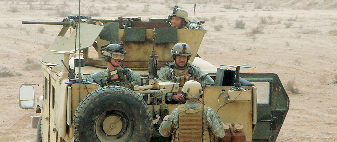 ODA 563 and Iraqi Hilla SWAT police prepare to enter the contact area on 28 January 2007 during the two-day Battle of An Najaf.
