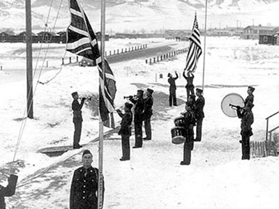 A joint Canadian-American Retreat ceremony performed at Fort William Henry Harrison, Montana, 1942. The First Special Service Force was a formidable fighting unit that seamlessly blended the soldiers of two nations.