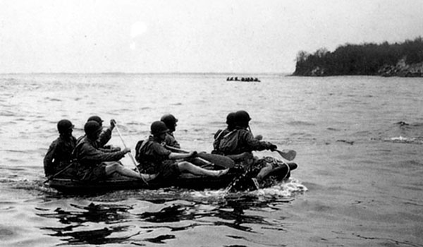 Forcemen training in seven-man rubber boats at Camp Bradford, Virginia. In the invasion of Kiska, the Forcemen used rubber boats to infiltrate the island.