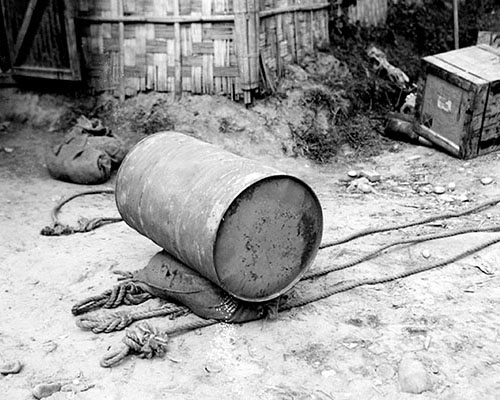 Gasoline was dropped in fifty-five gallon drums padded with rice hulls or sawdust.