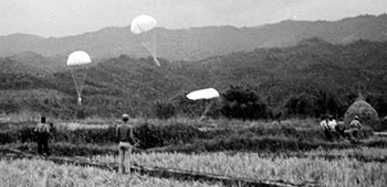 11. An OSS Detachment 101 group receives a supply drop in north Burma, late 1944-early 1945.