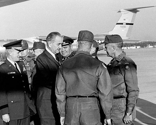 President Lyndon B. Johnson visited Fort Bragg to farewell the 3rd Brigade of the 82nd Airborne Division as it deployed to Vietnam in February 1968. COL Blackburn, the ADC-S is at the far right.