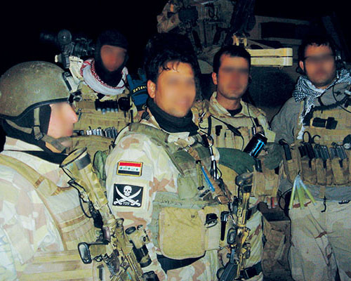 Iraqi Raptor assaulters in combat gear.