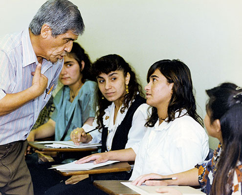 Dr. Ehsan Entezar teaching an ESL class. This program was designed to help facilitate integration into American society.