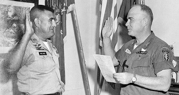 LTC Eldred E. “Red” Weber, Deputy Commanding Officer, 8th SFG and Acting Commander, 8th SFG, 2 June 1967, re-enlisting MSG Roland Milliard.