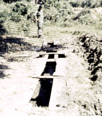 The slit trench latrine built by the SF medics was treated like a shrine by the Bolivians and never used.