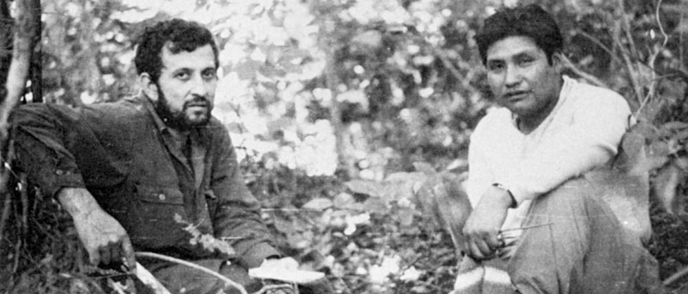 Moisés Guevara Rodríguez (right) was a mine labor leader who led a breakaway Maoist faction of Bolivian Communists. Orlando (“Antonio”) Pantoja Tamayo (left) was a veteran of the Sierra Maestras and the Chief of Cuba’s Border Guard. This photo was probably taken in camp in late March 1967. Notice Guevara’s fresh look compared to Antonio’s haggard appearance after the “Long March.”