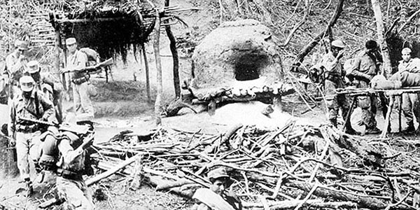 A Bolivian Army unit searches the Ñancahuazú guerrilla camp #1. The Army kept the area under surveillance in case the foco attempted to return. The Army discovered hidden supply caches as late as August 1967.