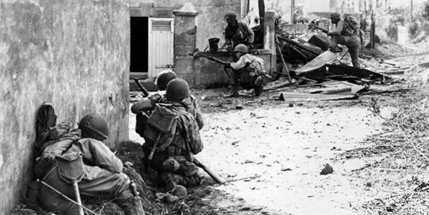 VII Corps infantrymen fighting through one of the villages near Brest.