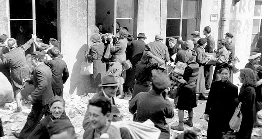 Displaced Persons and Germans loot a grocery