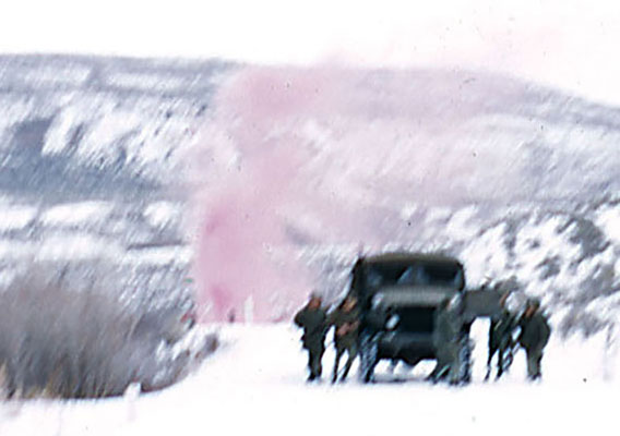 Left-Smoke grenades “disabled” convoy vehicles during an ambush on 12 February 1960.