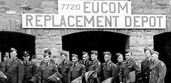 Private *John C. Anderson and the second group of Lodge Act soldiers assembled in front of the EUCOM 7720th Replacement Depot in Sonthofen.