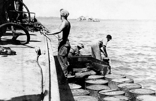 At Kyaukpyu, P-564 had to be refueled from 55-gallon drums transported from shore in amphibious DUKW “ducks” because destroyed port facilities prevented the Air-Sea Rescue Boats from docking.