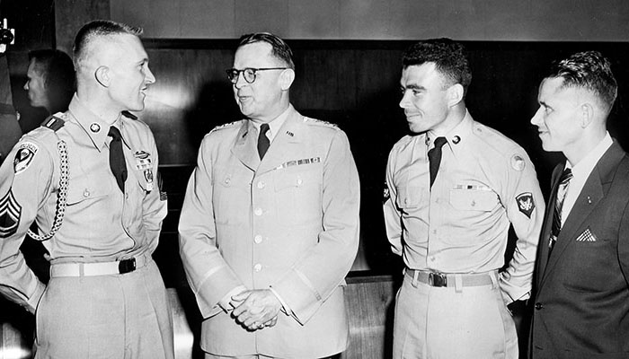 SFC Michael Kremar (Czech), SP3 John F. Gordon (Pole), and Michael Daradan (Russian) were sworn in as naturalized citizens in the U.S. District Court in Washington, DC in late August 1956.