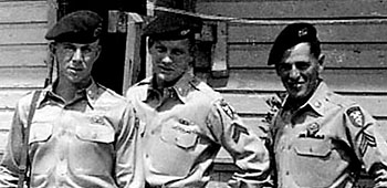 Corporal Victor Kreisman and 77th SFG buddies sport green berets at Fort Bragg.