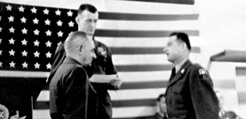Private Stanley Skowron received the English Course Certificate at Fort Devens, MA from COL George V. Baker on 15 April 1954.