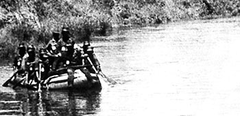 At Song Mao ARVN Rangers learn how to conduct a river patrol in rubber assault boats.