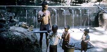 Constructing spillways gave villagers a place to wash themselves and their clothes, and the children a place to play.
