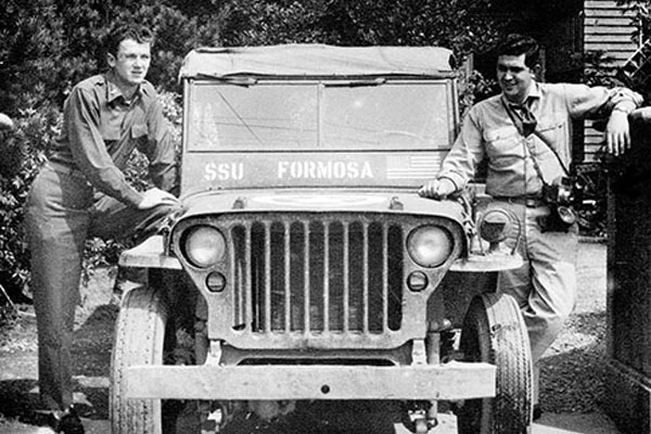 LT William Lawson and DiBlasi stand by the SSU Formosa Mission jeep.