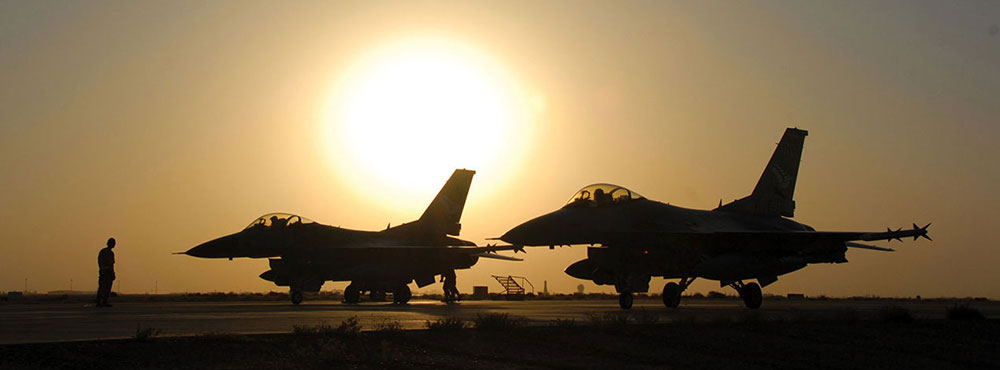 U.S. Air Force F-16 Fighting Falcons prepare for operations at Balad Airbase, Iraq.