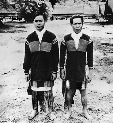 Montagnard elders dressed for a special occasion in Rhade tribal ceremonial attire.