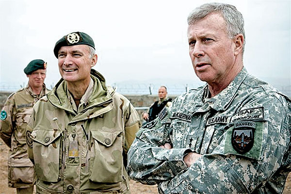 Dutch Brigadier General Tom A. Middendorp with U.S. General David D. McKiernan, the ISAF Commander. As the RC South Commander, Brig Gen Middendorp employed a population-centric strategy for operations in Oruzgan Province.