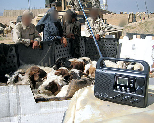 Two key ARSOF missions were communications and humanitarian assistance. The hand-cranked radios were popular and enabled the PSYOP teams broadcasting from the FB Tycz radio station to provide the population with information. The goats were being de-wormed and inoculated as part of a Veterinary Civic Action Program (VETCAP).