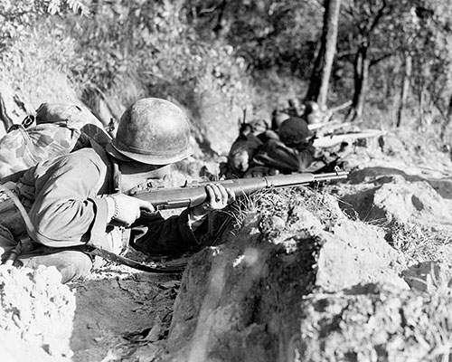 Soldiers of the 475th Infantry attempt to capture Loi-Kang hill on 17 January 1945. Stubborn Japanese resistance prevented their success until much later.