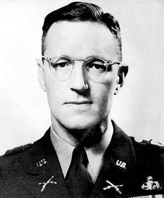 At the time of the badge’s design, the commander of the 10th Special Forces Group was Colonel William E. Ekman.