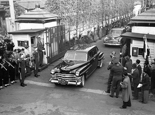 GEN MacArthur’s limousine and entourage were protected by GHQ Honor Guards and given a wide berth as sirens announced its approach.