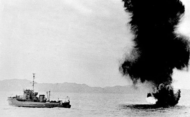 The Minesweeper CMS Mocking Bird explodes a mine in Chinnamp’o harbor, November 1950.