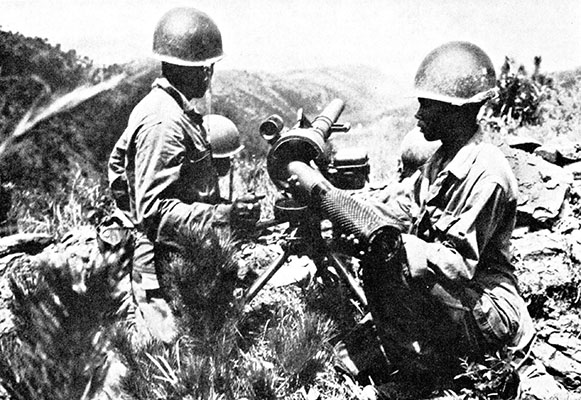 Allied units soon had more firepower, even at the lowest levels. Here, American troops prepare to fire a 75 mm recoilless rifle.