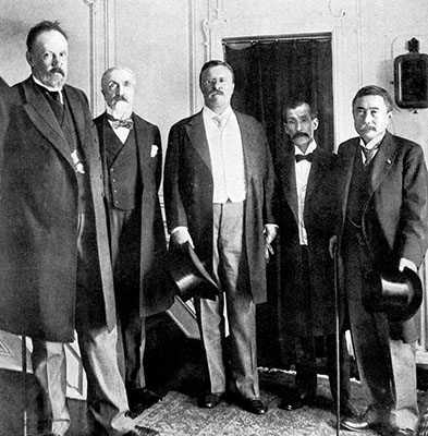 Theodore Roosevelt, with peace envoys from Russia and Japan at the signing of the Treaty of Portsmouth, 1905.