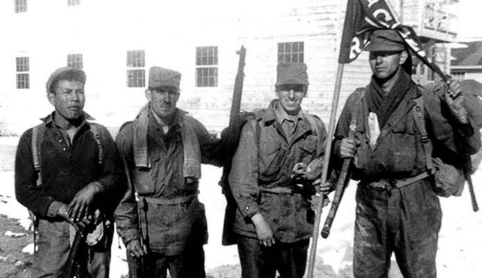 Rangers Timothy “Chief” Ontayabbi, James F. Donnelly, Nicholas R. Gallo, and John G. “Corky” Wray train at Camp Carson, Colorado in early 1951.