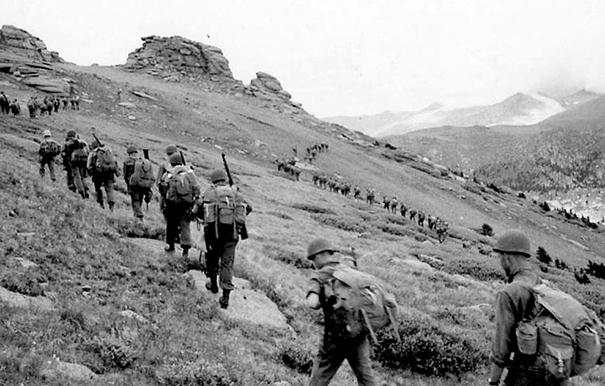 The training at Camp Carson involved long marches over mountain terrain.
