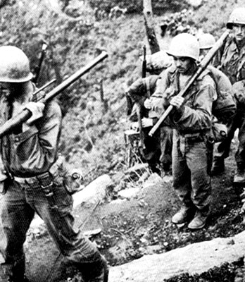 Troops of the 2nd Infantry Division move to occupy new positions near Yanggu. The hard-fighting 2nd Division was a mainstay of the U.S. X Corps.