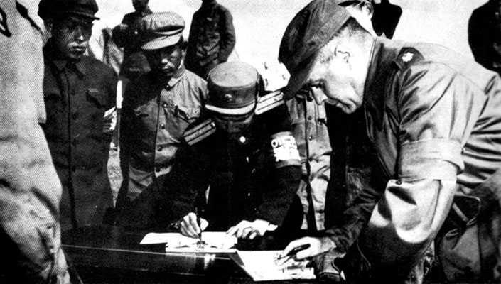 UN and North Korean officers acknowledge receipt of transferred POWs at Freedom Village, Panmunjom. In Operation LITTLE SWITCH on 11 April 1953, 605 UN POWs were exchanged for 6,030 Communist prisoners.