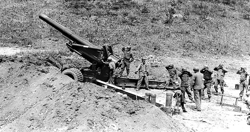 A Battery, 17th Field Artillery firing their 8” howitzers in April 1951.
