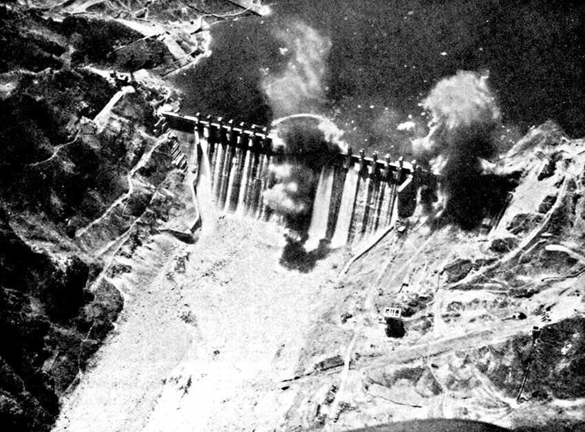 Aerial view of the dam under attack by U.S. Navy AD-6 Skyraiders.