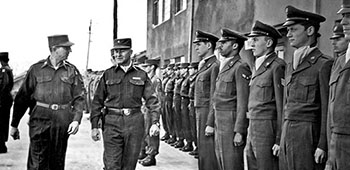 BG Martin and CPT Oliver M. Rodman inspect U.S.A.F. personnel from the 581st Reproduction Squadron.