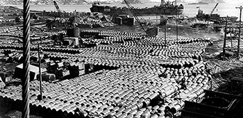 A field of 55 gallon fuel drums at the beach landing sites at Hungnam.