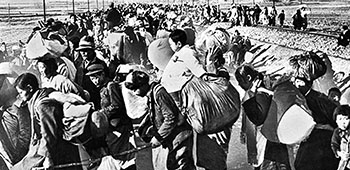 The Allied military force was hard-pressed to turn back the large numbers of North Korean refugees fleeing Hamhung along the railroad to Hungnam.