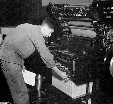 CPL Richard N. Crimer, 3rd Reproduction Company, operates a Harris printing press at the FECOM print plant.