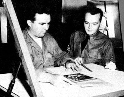 Sergeant First Class Thomas S. Anderson, 3rd Repro “press boss,” and CPL Woodrow W. Venters discuss photo lithography needed for a Psywar leaflet.