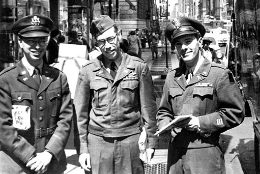NBC employees Robert M. Zweck, David Housman, and Walter D. Ehrgott of the 406th MRBC reporting to the military induction center in New York on 1 May 1951, the day of the 301st RB&L Group’s federalization.