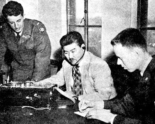 2LT Alvin Yudkoff, unknown translator, and SGT Robert Herguth turned English scripts into top network caliber Chinese and Korean programs broadcast as VUNC from Studio 19 in Radio Tokyo.