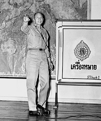 CPT Avedon instructs a Thai audience on the utility of psychological warfare.