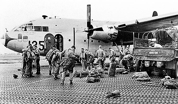 At Taegu 187th Airborne Regimental Combat Team (ARCT) paratroopers boarded C-119s and were flown to Japan. They donned parachutes and “Mae West” life preservers before boarding a 483rd Troop Carrier Wing U.S. Air Force C-119 Flying Boxcar.